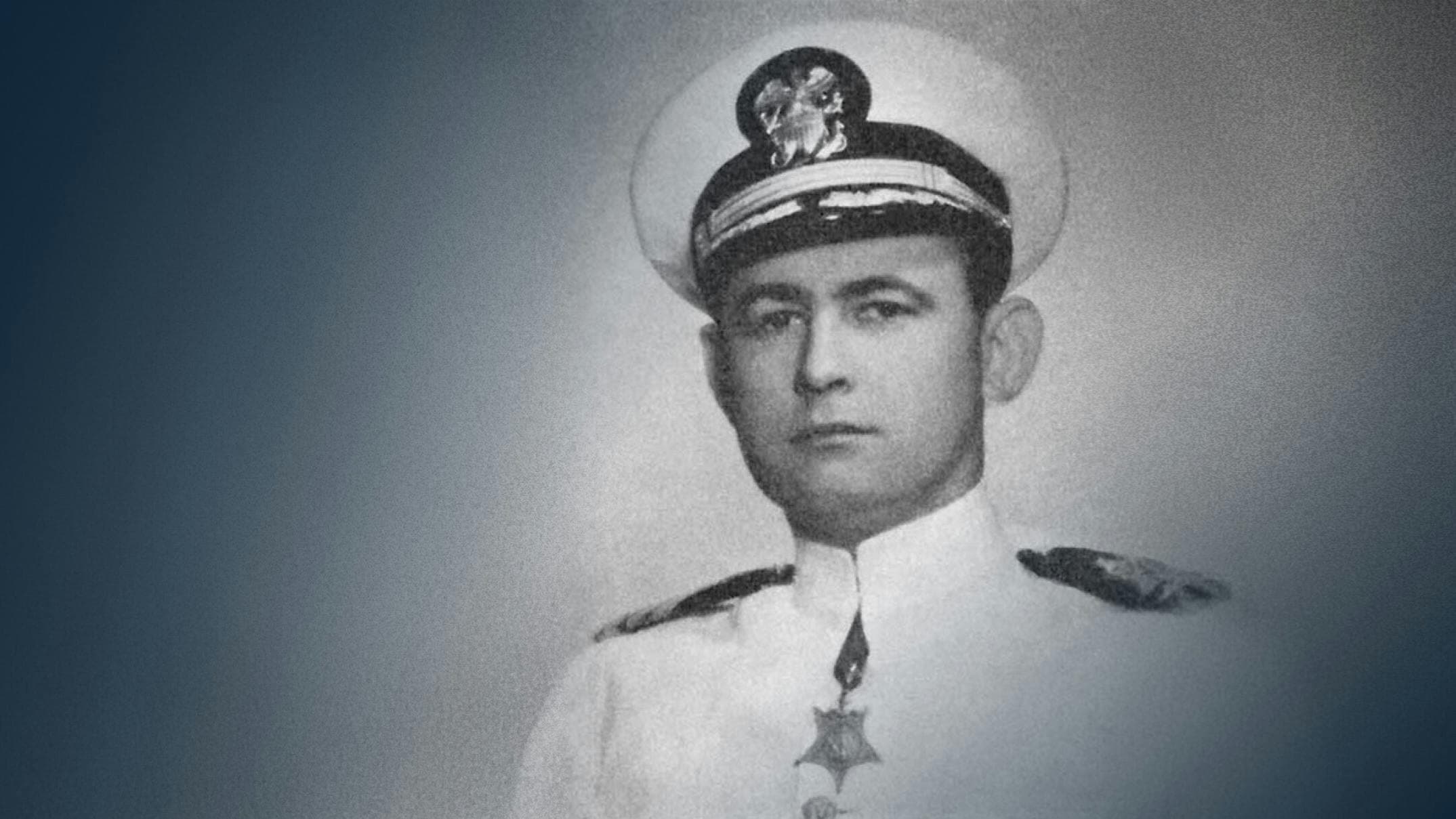 Rear Admiral Bruce McCandless wearing the Medal of Honor